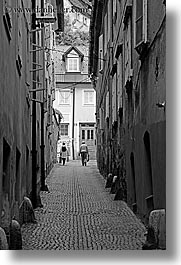 black and white, cities, couples, europe, ljubljana, narrow, slovenia, streets, towns, vertical, walking, photograph