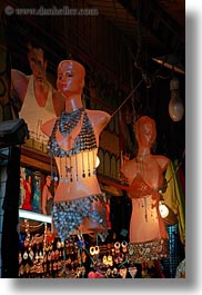 africa, cairo, egypt, illuminated, mannequins, old town, vertical, photograph
