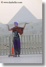 africa, cairo, clothes, egypt, girls, keffiyeh, lamps, people, pyramids, scarves, vertical, photograph