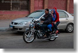 africa, cairo, egypt, horizontal, men, motorcyce, people, womens, photograph