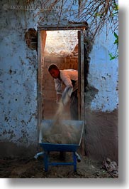 africa, doorways, egypt, men, nubian village, shoveling, vertical, photograph