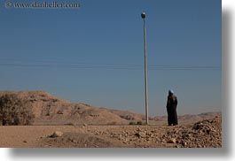 africa, egypt, horizontal, lights, men, people, poles, standing, photograph