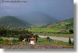 asia, bhutan, buddhist, colors, flags, foggy, green, hills, horizontal, landscapes, religious, stupas, valley, photograph