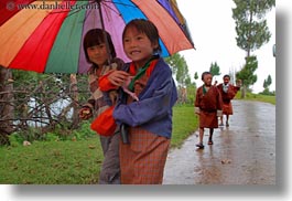 asia, asian, bhutan, childrens, clothes, colorful, colors, costumes, emotions, horizontal, people, smiles, style, umbrellas, photograph