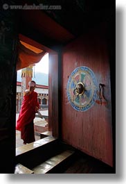 asia, asian, bhutan, boys, buddhist, clothes, doors, men, monks, people, religious, robes, style, vertical, photograph