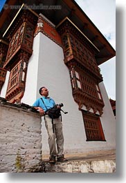 artists, asia, asian, bhutan, cameras, hashmat, people, photographers, punakha dzong, temples, vertical, photograph