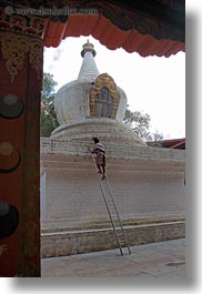 asia, asian, bhutan, buddhist, ladder, men, people, punakha dzong, religious, temples, vertical, photograph