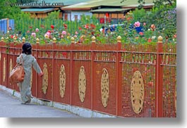 asia, asian, bhutan, buddhist, fences, girls, horizontal, people, religious, roses, style, tashichho dzong, walking, photograph