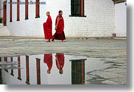 asia, asian, bhutan, buddhist, clothes, horizontal, monks, nature, people, puddle, reflections, religious, robes, style, tashichho dzong, water, photograph