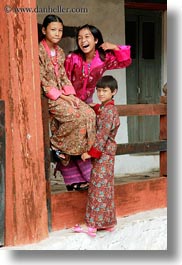 asia, asian, bhutan, girls, laughing, people, vertical, wangduephodrang dzong, photograph