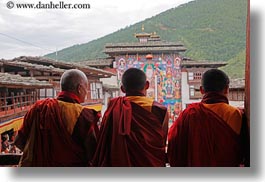 asia, asian, balconies, bhutan, buddhist, clothes, colors, horizontal, monks, people, religious, robes, saffron, style, wangduephodrang dzong, photograph