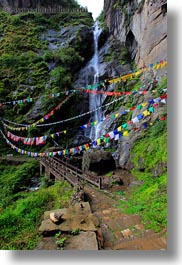 asia, bhutan, bridge, buddhist, flags, lush, nature, prayer flags, religious, vertical, water, waterfalls, photograph