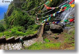 asia, bhutan, bridge, buddhist, flags, hikers, horizontal, lush, nature, prayer flags, religious, water, waterfalls, photograph