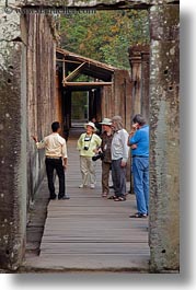 angkor thom, asia, bayon, cambodia, guides, lecturing, tourists, vertical, photograph
