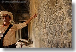 angkor wat, arts, asia, bas reliefs, cambodia, explaining, guides, horizontal, photograph