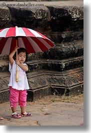 angkor wat, asia, cambodia, childrens, girls, people, red, striped, umbrellas, vertical, white, photograph