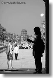 angkor wat, asia, black and white, cambodia, doors, frames, people, silhouettes, vertical, photograph