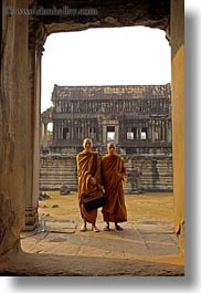 angkor wat, asia, browns, cambodia, monks, people, robes, two, vertical, photograph