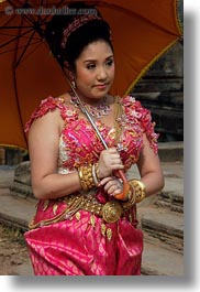 angkor wat, asia, cambodia, dresses, people, traditional, umbrellas, vertical, womens, photograph