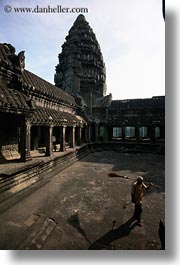 angkor wat, asia, brooms, cambodia, courtyard, men, towers, vertical, photograph