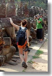 asia, cambodia, gates, men, photographing, south gate, vertical, womens, photograph