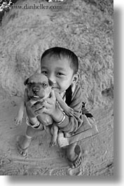 asia, black and white, boys, cambodia, people, puppies, vertical, photograph