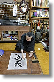 asia, calligraphers, finishing, japan, people, spray, vertical, photograph