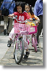 asia, bicycles, girls, japan, people, red, vertical, photograph