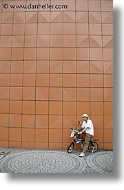 asia, bicycles, cellphone, japan, men, people, vertical, photograph