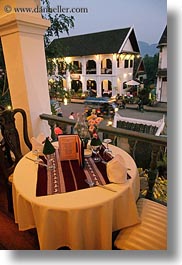 asia, buildings, dining, hotels, laos, luang prabang, structures, tables, vertical, photograph