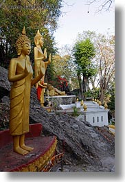 asia, buddhas, buildings, golden, laos, luang prabang, phou si mountain, statues, temples, vertical, photograph