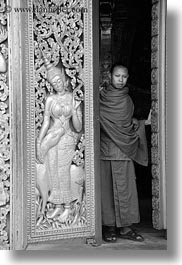apsara, asia, black and white, buddhist, buildings, doors, golden, laos, luang prabang, monks, people, religious, temples, vertical, womens, xiethong, photograph