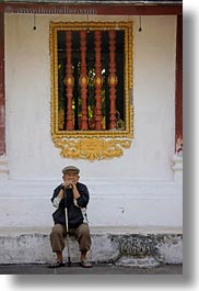 asia, beret, cane, clothes, emotions, hats, laos, luang prabang, men, old, people, sitting, solitude, vertical, walking, photograph