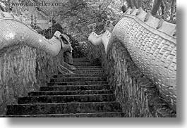 asia, asian, black and white, boy and stairs, boys, colors, horizontal, laos, luang prabang, men, monks, oranges, people, snakes, stairs, photograph