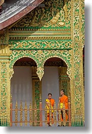 asia, asian, colors, laos, luang prabang, men, monks, oranges, palace, people, temples, two, vertical, photograph