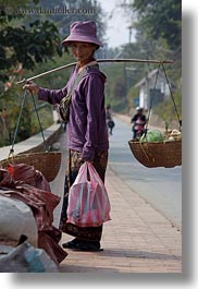 asia, asian, carrying, clothes, don ganh, hats, laos, luang prabang, people, vertical, womens, photograph