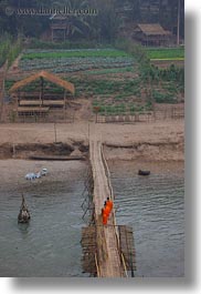 agriculture, asia, bamboo, bridge, buildings, crossing, huts, laos, luang prabang, materials, monks, nature, rivers, scenics, structures, vertical, water, photograph