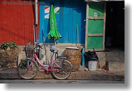 asia, bicycles, bikes, green, horizontal, laos, luang prabang, pink, transportation, umbrellas, photograph