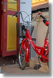 asia, baskets, bicycles, bikes, laos, luang prabang, red, transportation, vertical, photograph