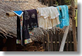 asia, hangings, hmong, horizontal, huts, laos, laundry, thatched, villages, photograph