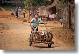 asia, carts, hmong, horizontal, laos, logs, pushing, villages, womens, photograph