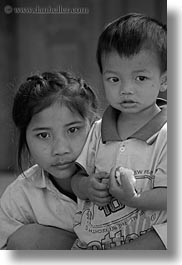 asia, asian, black and white, boys, girls, laos, people, river village, shirts, vertical, villages, yellow, photograph