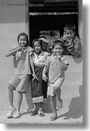 asia, asian, black and white, childrens, emotions, laos, laugh, people, playing, river village, smiles, vertical, villages, windows, photograph