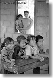 asia, asian, black and white, childrens, desks, emotions, laos, people, poverty, river village, school, smiles, vertical, villages, photograph