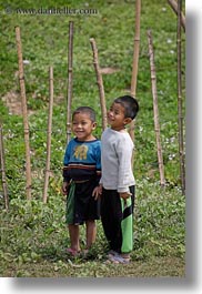 asia, asian, boys, emotions, fields, laos, people, river village, smiles, vertical, villages, young, photograph