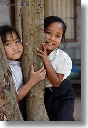 asia, asian, emotions, girls, laos, people, river village, smiles, trees, vertical, villages, photograph