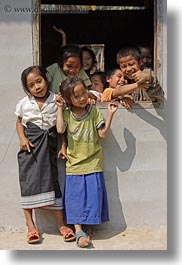 asia, asian, childrens, emotions, groups, laos, laugh, people, playing, river village, smiles, vertical, villages, windows, photograph