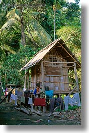 asia, huts, laos, poverty, river village, roofs, thatched, vertical, villages, photograph