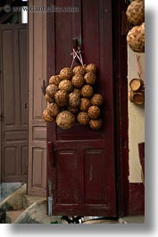 asia, balls, doors, laos, river village, vertical, villages, wicker, photograph