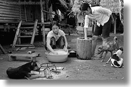 animals, asia, asian, black and white, clothes, dogs, horizontal, laos, people, poverty, river village, villages, washing, womens, photograph